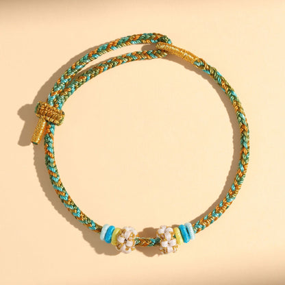 Chinese style, lily of the valley peach blossom bracelet hand-woven thousands of miles of rivers and mountains bracelet transfer beads red rope