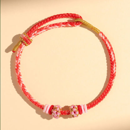 Chinese style, lily of the valley peach blossom bracelet hand-woven thousands of miles of rivers and mountains bracelet transfer beads red rope