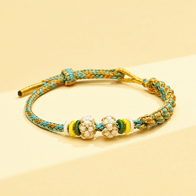 Chinese style, lily of the valley peach blossom bracelet hand-woven thousands of miles of rivers and mountains bracelet transfer beads red rope